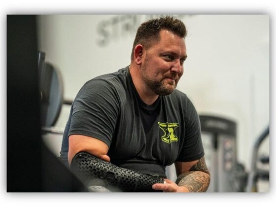 Man speaking in rehabilitation gym