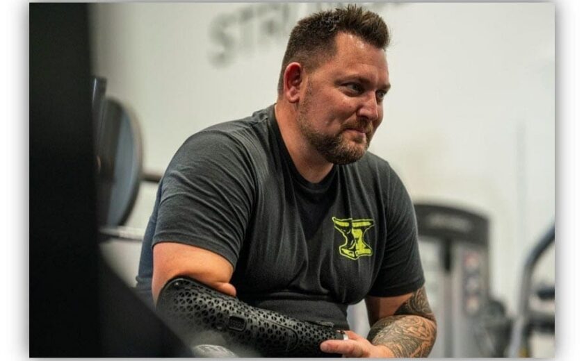 Man speaking in rehabilitation gym