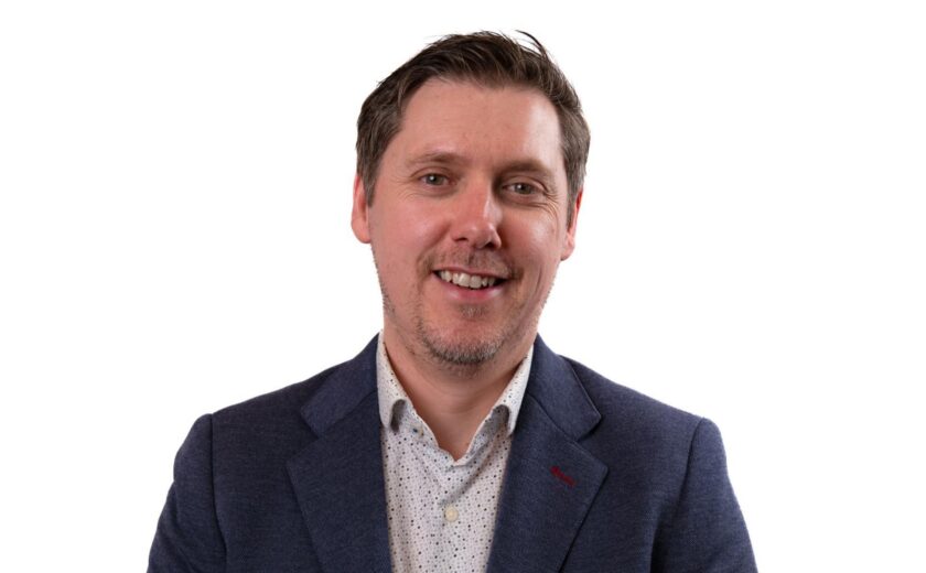 Michael Gray smiling in professional headshot