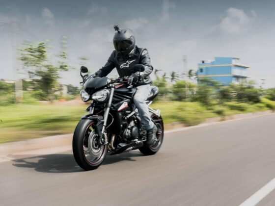 Motorcyclist riding on open road