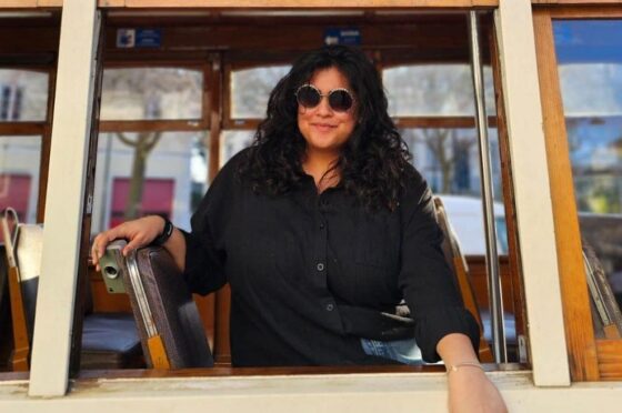 Nermeen Salahuddin seated by window