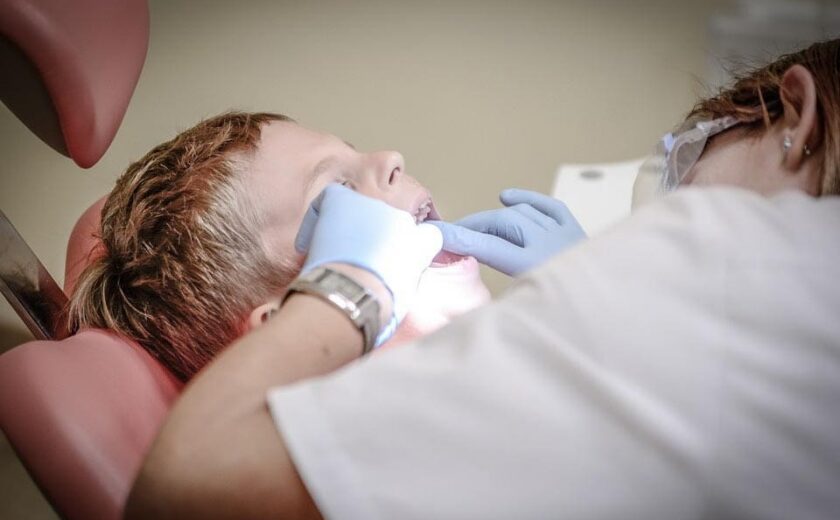 Patient receiving dental treatment