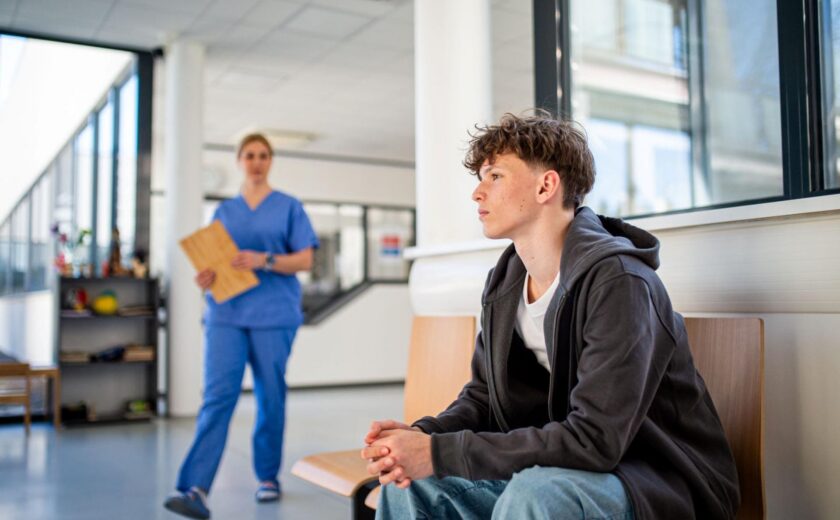 Patient waiting in hospital consultation area
