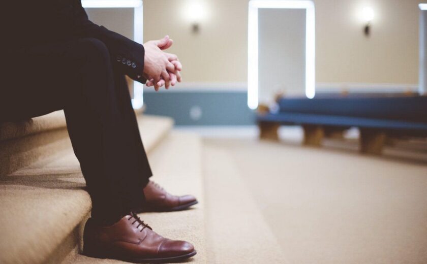 Person sitting alone in hospital waiting area