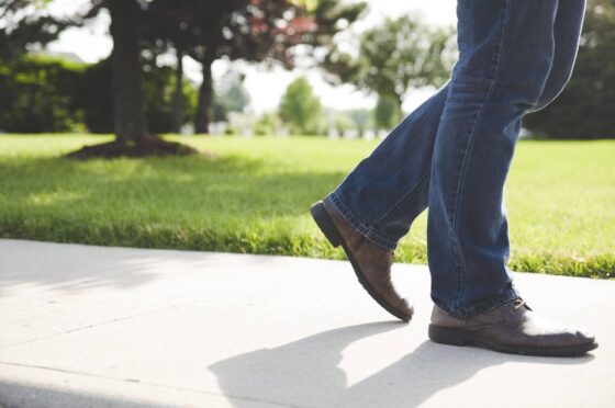 Person walking on pavement
