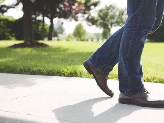 Person walking on pavement