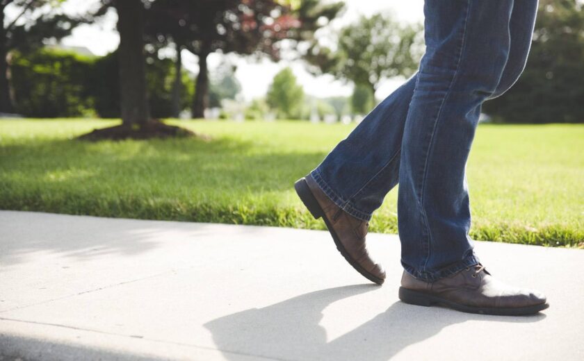 Person walking on pavement