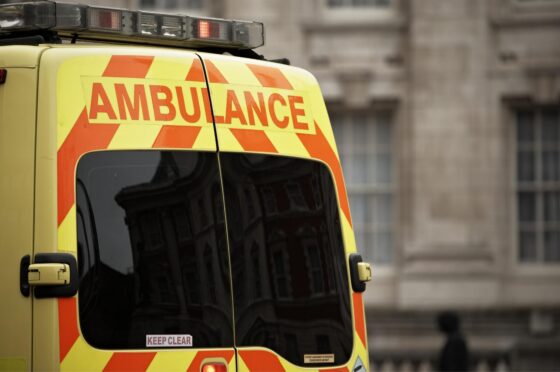 Rear of ambulance parked in city