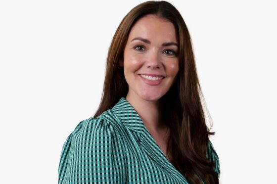 Sarah Ouko smiling in professional headshot
