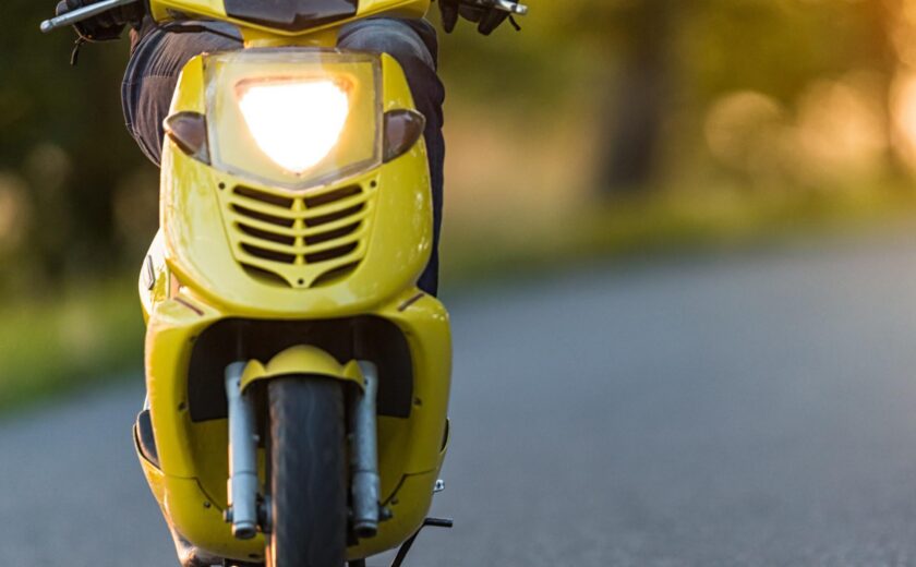 Scooter rider on road
