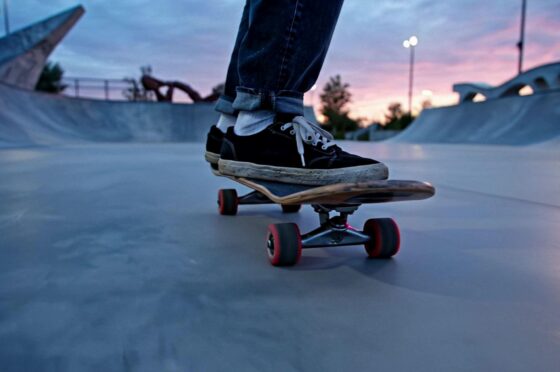 Skateboarder riding in skate park