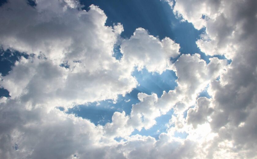Sun rays breaking through clouds