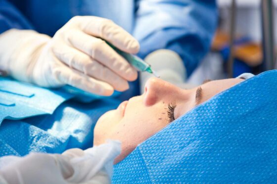 Surgeon operating on patient's eye