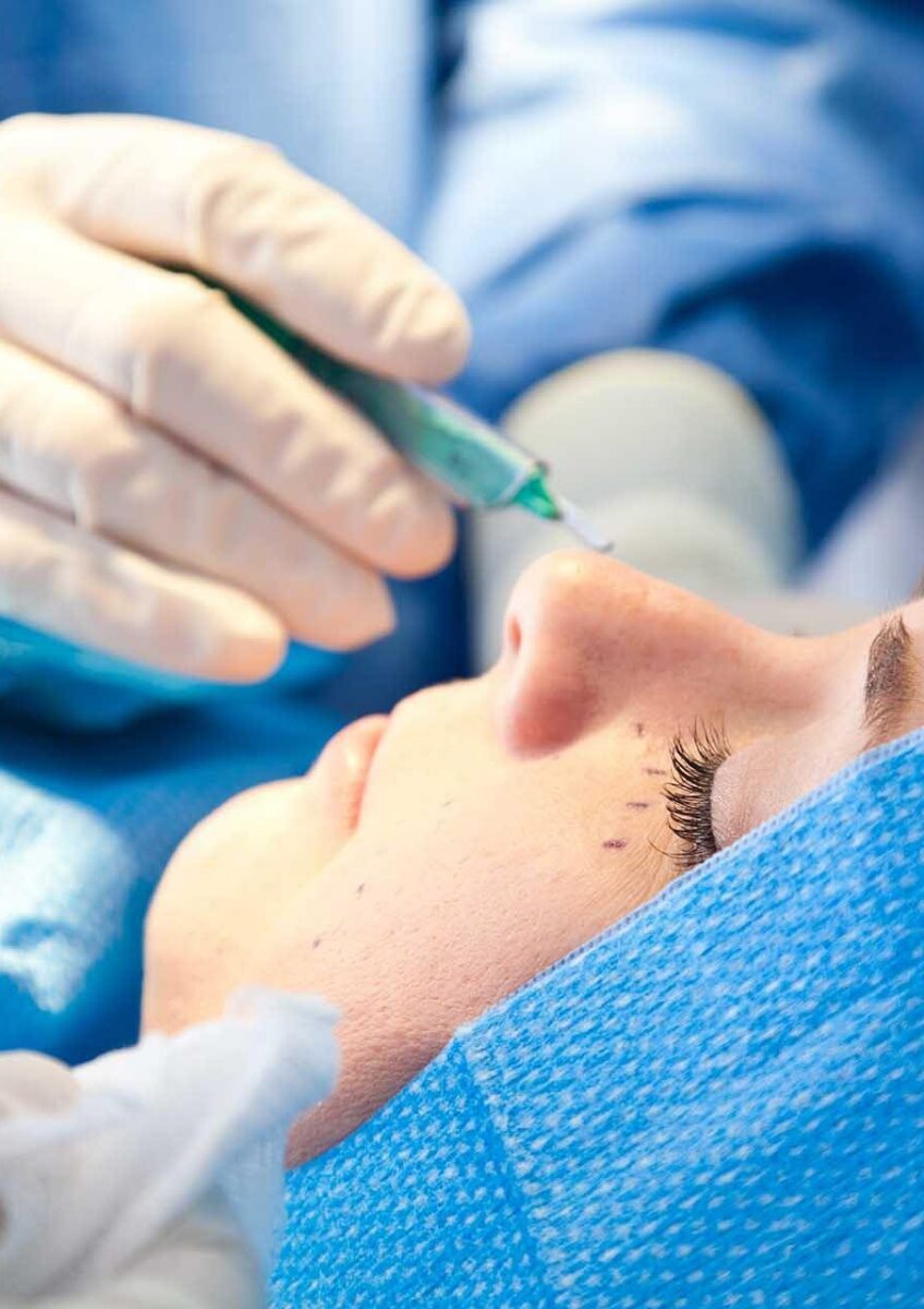 Surgeon operating on patient's eye