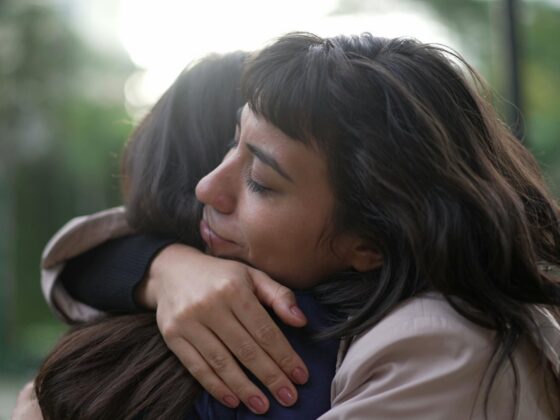 Woman hugging friend
