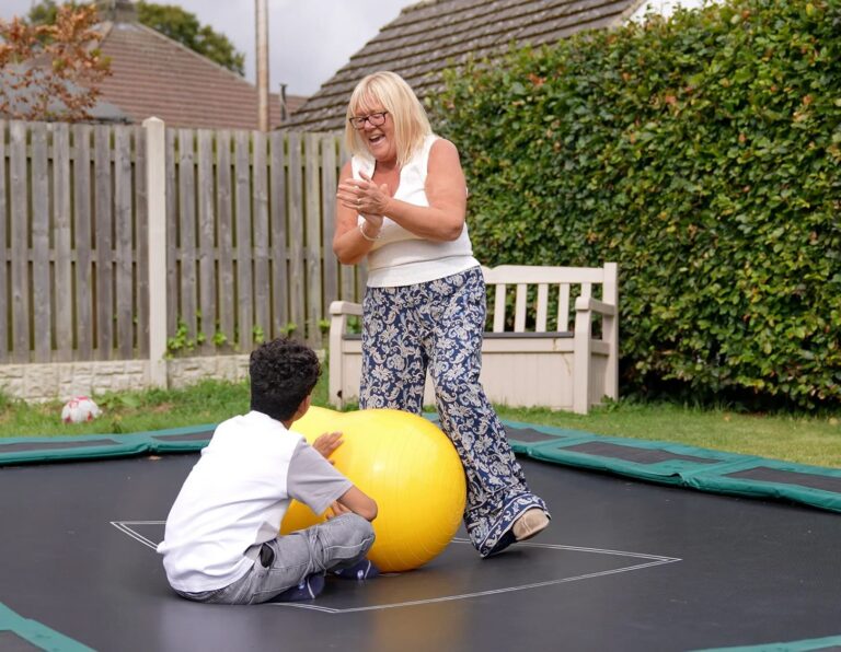 Michelle on the trampoline with Charlie