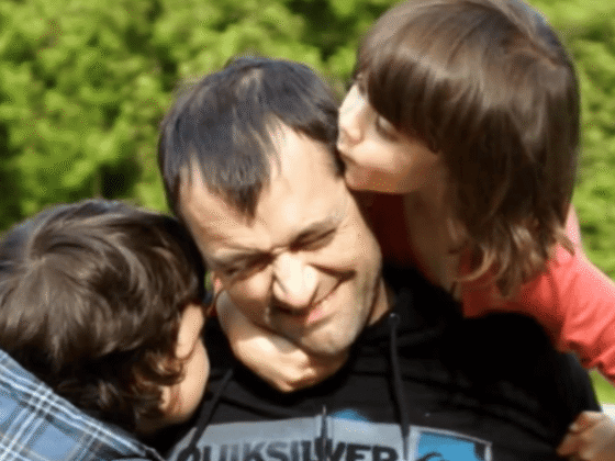 Sarah's husband Nick with their two children
